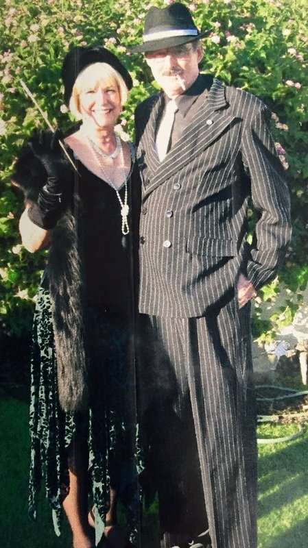 920's Mens Gangster and 1920's Green Womens Dress